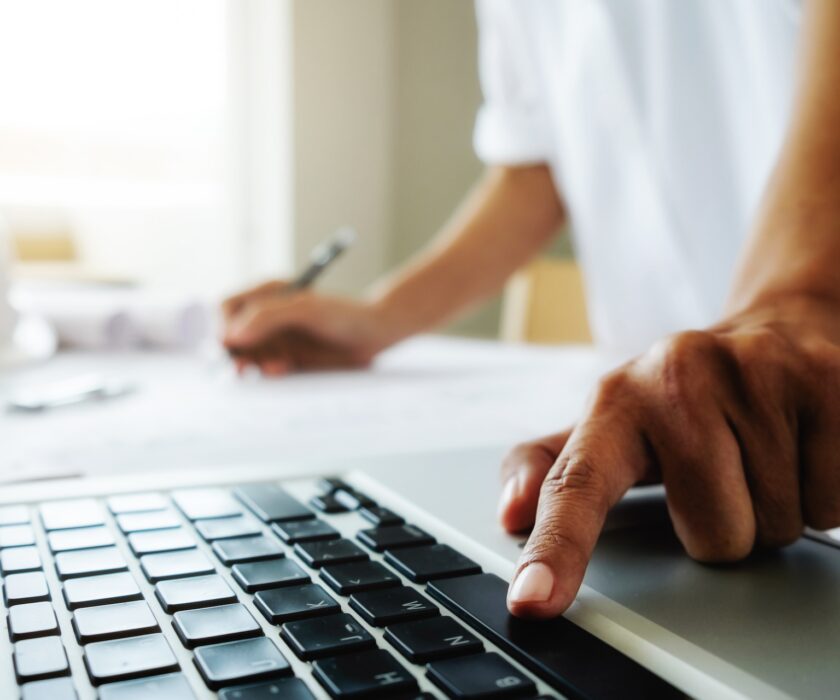 Hands of Engineer working on blueprint,Construction concept. Engineering tools.Vintage tone retro filter effect,soft focus(selective focus)