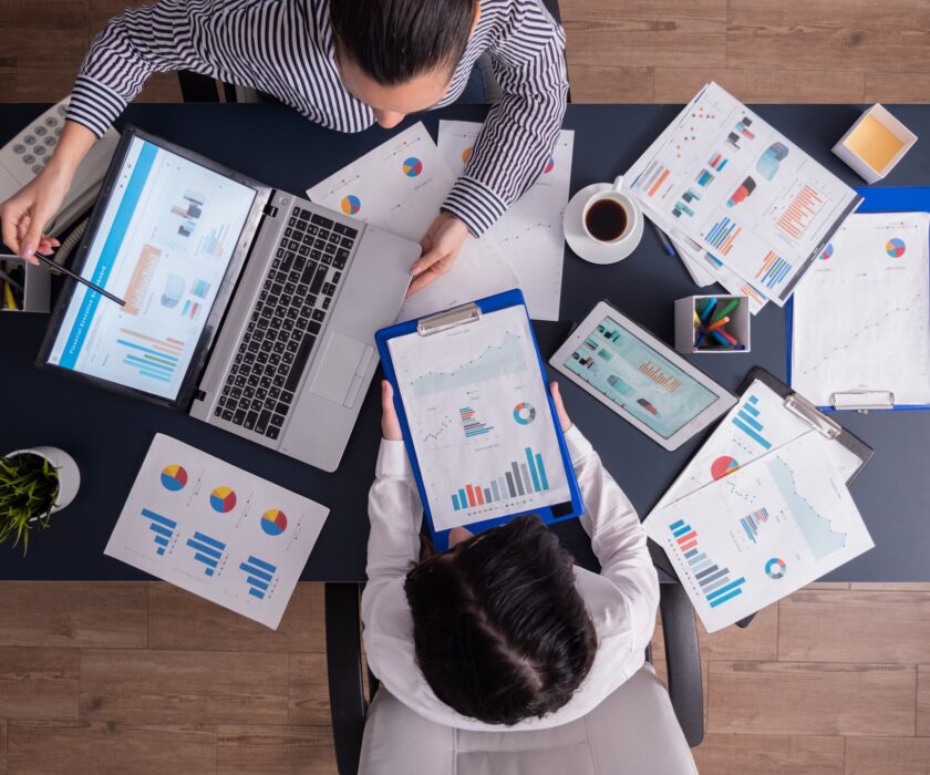 Top view of manager and employee doing teamwork